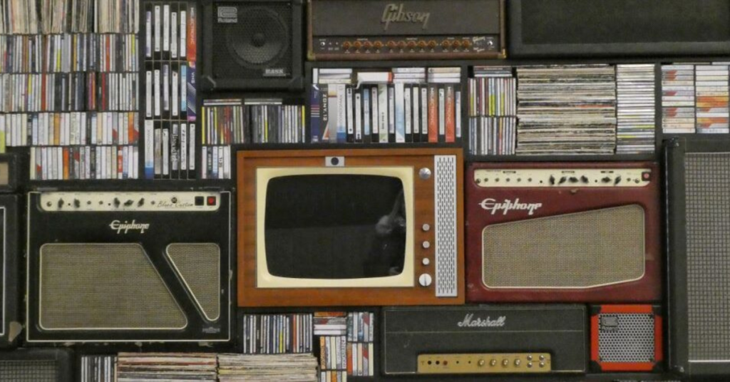 Vintage speakers, CDs, and vinyl records